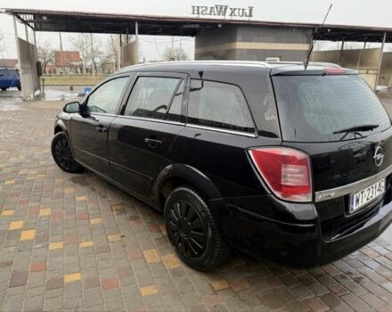 Черный Опель Астра, объемом двигателя 1.7 л и пробегом 240 тыс. км за 2800 $, фото 4 на Automoto.ua