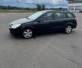 Черный Опель Астра, объемом двигателя 1.6 л и пробегом 239 тыс. км за 4300 $, фото 3 на Automoto.ua
