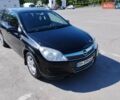 Черный Опель Астра, объемом двигателя 1.6 л и пробегом 240 тыс. км за 5250 $, фото 1 на Automoto.ua