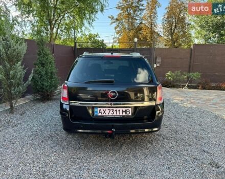 Черный Опель Астра, объемом двигателя 1.8 л и пробегом 248 тыс. км за 5500 $, фото 4 на Automoto.ua
