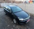 Черный Опель Астра, объемом двигателя 1.6 л и пробегом 208 тыс. км за 5000 $, фото 3 на Automoto.ua