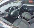 Черный Опель Астра, объемом двигателя 1.25 л и пробегом 330 тыс. км за 4900 $, фото 1 на Automoto.ua
