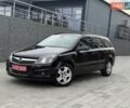 Чорний Опель Астра, об'ємом двигуна 1.6 л та пробігом 241 тис. км за 5499 $, фото 1 на Automoto.ua