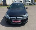 Черный Опель Астра, объемом двигателя 1.8 л и пробегом 231 тыс. км за 5000 $, фото 1 на Automoto.ua