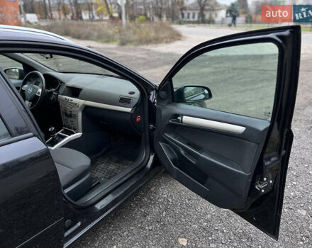 Черный Опель Астра, объемом двигателя 1.8 л и пробегом 209 тыс. км за 5600 $, фото 30 на Automoto.ua