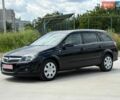 Черный Опель Астра, объемом двигателя 1.9 л и пробегом 258 тыс. км за 5600 $, фото 1 на Automoto.ua