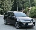 Черный Опель Астра, объемом двигателя 1.7 л и пробегом 280 тыс. км за 5600 $, фото 1 на Automoto.ua