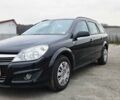 Черный Опель Астра, объемом двигателя 1.6 л и пробегом 210 тыс. км за 5850 $, фото 3 на Automoto.ua