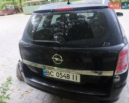 Черный Опель Астра, объемом двигателя 1.6 л и пробегом 250 тыс. км за 5200 $, фото 5 на Automoto.ua