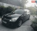 Черный Опель Астра, объемом двигателя 1.9 л и пробегом 287 тыс. км за 5400 $, фото 1 на Automoto.ua