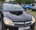 Черный Опель Астра, объемом двигателя 1.6 л и пробегом 262 тыс. км за 6199 $, фото 1 на Automoto.ua