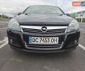 Черный Опель Астра, объемом двигателя 1.6 л и пробегом 212 тыс. км за 5200 $, фото 2 на Automoto.ua
