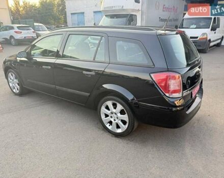 Черный Опель Астра, объемом двигателя 1.4 л и пробегом 170 тыс. км за 4900 $, фото 8 на Automoto.ua