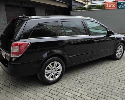 Черный Опель Астра, объемом двигателя 1.7 л и пробегом 224 тыс. км за 5599 $, фото 10 на Automoto.ua