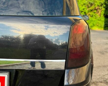 Черный Опель Астра, объемом двигателя 1.6 л и пробегом 219 тыс. км за 4510 $, фото 12 на Automoto.ua