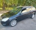 Чорний Опель Астра, об'ємом двигуна 1.4 л та пробігом 218 тис. км за 5400 $, фото 1 на Automoto.ua