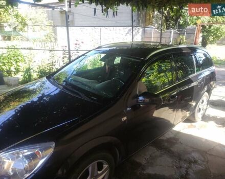 Черный Опель Астра, объемом двигателя 1.6 л и пробегом 205 тыс. км за 5700 $, фото 15 на Automoto.ua