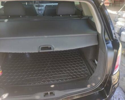 Черный Опель Астра, объемом двигателя 1.6 л и пробегом 205 тыс. км за 5700 $, фото 33 на Automoto.ua