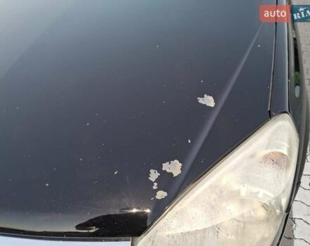 Черный Опель Астра, объемом двигателя 1.7 л и пробегом 276 тыс. км за 4300 $, фото 7 на Automoto.ua