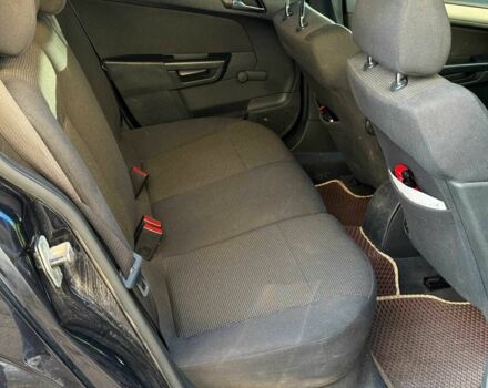 Черный Опель Астра, объемом двигателя 1.6 л и пробегом 219 тыс. км за 4510 $, фото 22 на Automoto.ua