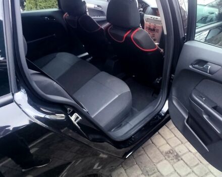 Черный Опель Астра, объемом двигателя 1.6 л и пробегом 220 тыс. км за 5800 $, фото 12 на Automoto.ua