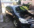 Черный Опель Астра, объемом двигателя 1.6 л и пробегом 205 тыс. км за 5700 $, фото 3 на Automoto.ua