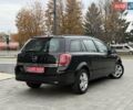 Черный Опель Астра, объемом двигателя 1.6 л и пробегом 240 тыс. км за 5550 $, фото 18 на Automoto.ua