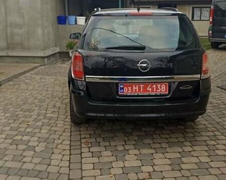 Черный Опель Астра, объемом двигателя 1.6 л и пробегом 249 тыс. км за 5650 $, фото 5 на Automoto.ua