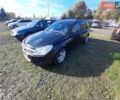 Черный Опель Астра, объемом двигателя 1.6 л и пробегом 260 тыс. км за 5200 $, фото 1 на Automoto.ua