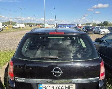Черный Опель Астра, объемом двигателя 1.6 л и пробегом 200 тыс. км за 4900 $, фото 6 на Automoto.ua