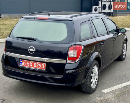 Черный Опель Астра, объемом двигателя 1.8 л и пробегом 200 тыс. км за 6999 $, фото 5 на Automoto.ua