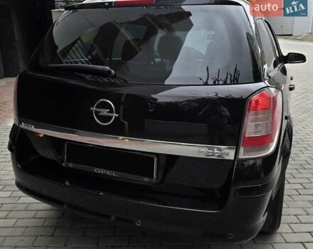 Черный Опель Астра, объемом двигателя 1.7 л и пробегом 224 тыс. км за 5650 $, фото 8 на Automoto.ua