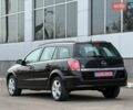 Черный Опель Астра, объемом двигателя 1.6 л и пробегом 187 тыс. км за 5500 $, фото 12 на Automoto.ua