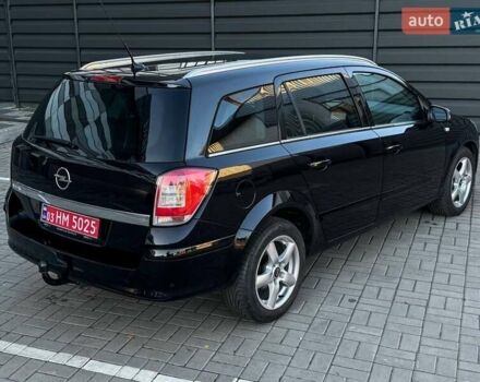 Черный Опель Астра, объемом двигателя 1.6 л и пробегом 160 тыс. км за 6200 $, фото 21 на Automoto.ua