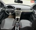 Черный Опель Астра, объемом двигателя 1.6 л и пробегом 240 тыс. км за 5550 $, фото 8 на Automoto.ua
