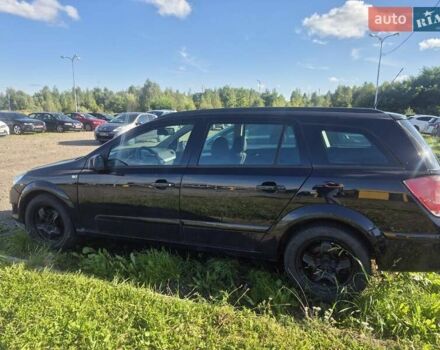 Черный Опель Астра, объемом двигателя 1.6 л и пробегом 200 тыс. км за 4900 $, фото 4 на Automoto.ua