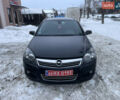 Черный Опель Астра, объемом двигателя 1.6 л и пробегом 240 тыс. км за 5600 $, фото 1 на Automoto.ua