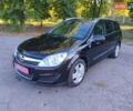 Черный Опель Астра, объемом двигателя 1.6 л и пробегом 186 тыс. км за 6100 $, фото 20 на Automoto.ua