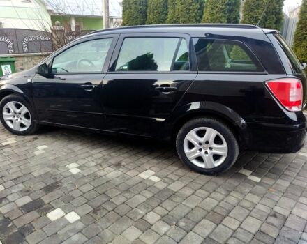 Черный Опель Астра, объемом двигателя 1.6 л и пробегом 220 тыс. км за 5800 $, фото 1 на Automoto.ua