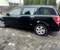 Черный Опель Астра, объемом двигателя 1.6 л и пробегом 220 тыс. км за 5800 $, фото 1 на Automoto.ua