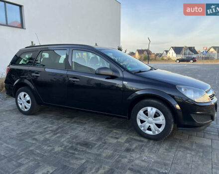 Черный Опель Астра, объемом двигателя 1.4 л и пробегом 242 тыс. км за 4450 $, фото 22 на Automoto.ua