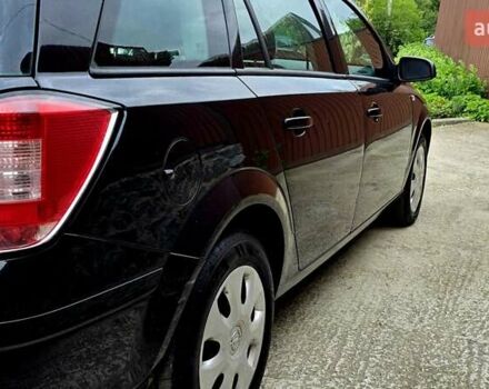 Черный Опель Астра, объемом двигателя 1.6 л и пробегом 238 тыс. км за 6299 $, фото 21 на Automoto.ua