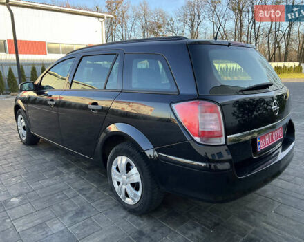 Черный Опель Астра, объемом двигателя 1.4 л и пробегом 242 тыс. км за 4450 $, фото 13 на Automoto.ua