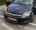Черный Опель Астра, объемом двигателя 1.6 л и пробегом 206 тыс. км за 6400 $, фото 1 на Automoto.ua