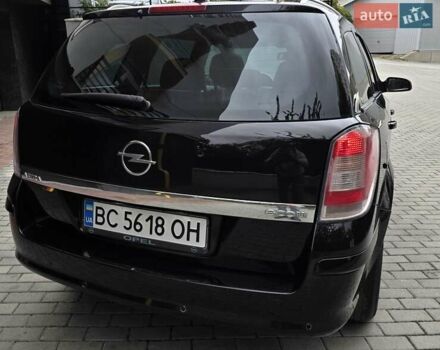 Черный Опель Астра, объемом двигателя 1.7 л и пробегом 224 тыс. км за 5599 $, фото 8 на Automoto.ua