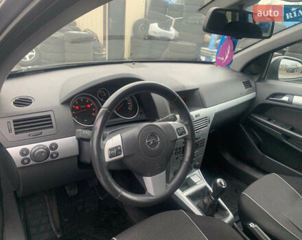 Черный Опель Астра, объемом двигателя 1.6 л и пробегом 232 тыс. км за 5500 $, фото 22 на Automoto.ua