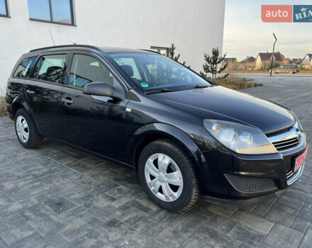 Черный Опель Астра, объемом двигателя 1.4 л и пробегом 242 тыс. км за 4450 $, фото 23 на Automoto.ua