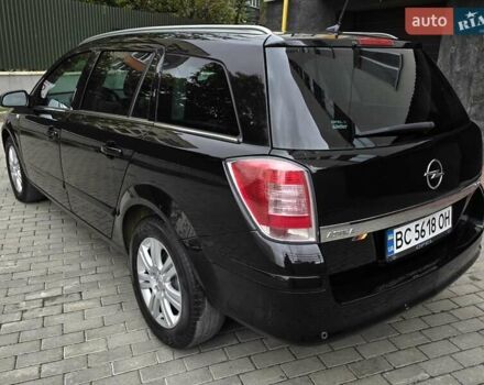 Черный Опель Астра, объемом двигателя 1.7 л и пробегом 224 тыс. км за 5599 $, фото 6 на Automoto.ua