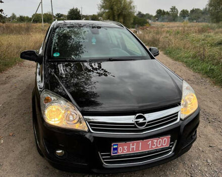 Черный Опель Астра, объемом двигателя 1.6 л и пробегом 230 тыс. км за 5750 $, фото 3 на Automoto.ua