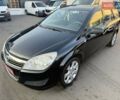 Черный Опель Астра, объемом двигателя 1.4 л и пробегом 170 тыс. км за 4900 $, фото 1 на Automoto.ua